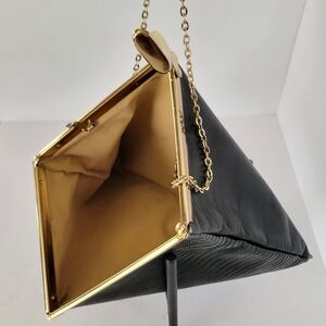 Sophisticated Black Triangle Clutch with Gold Accents
